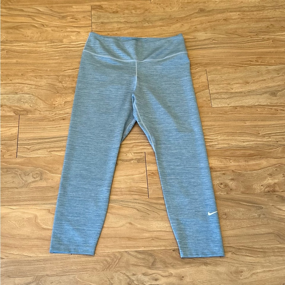 Nike Dri-Fit leggings in pale blue, size large.